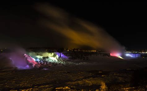 ‘Frozen’ technicolor Niagara Falls lit up in the night