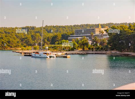 Croatia, Stari Grad. Hotel and private dock in harbor. Credit as: Fred ...