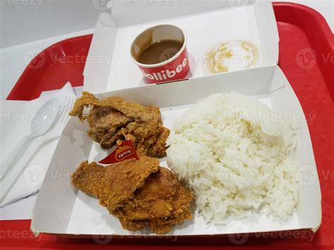 Fresh delicious crispy fried chicken golden brown with white rice on ...