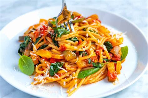 Quick and easy vegetable spaghetti recipe with lots of veggies and a simple tomato sauce made ...