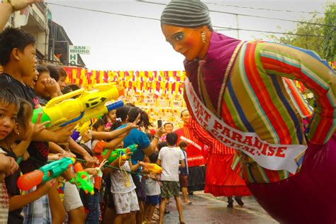 Higantes Festival.This higante (giant) is trying to scare some children as their means of ...