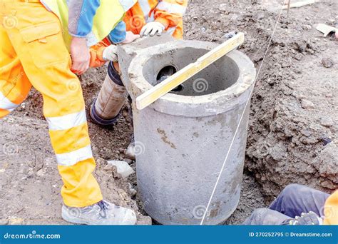 Groundworkers Installing New Road Gully during New Road Construction Stock Image - Image of ...