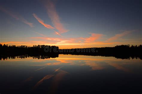 Autumn sunset over a lake stock photo. Image of beautiful - 128552486