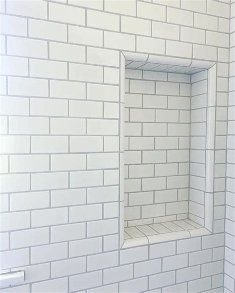 #girlsbathroom | White tile shower, Tile shower niche, Grey grout bathroom