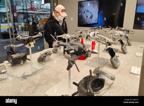 SHANGHAI, CHINA - JANUARY 28, 2022 - Customers look at products at a ...