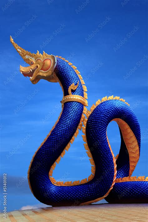 Naga statue of thailand with nice sky Stock Photo | Adobe Stock