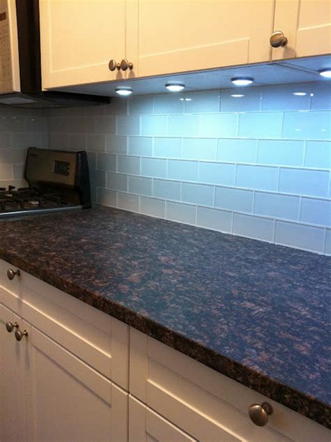 Kitchen with White Glass Subway Tiles backsplash - Contemporary - Kitchen - New York