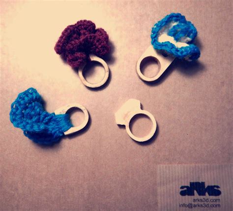 Rings is a collection of wooden milled rings, enhance by a small handmade crochet jewel ...