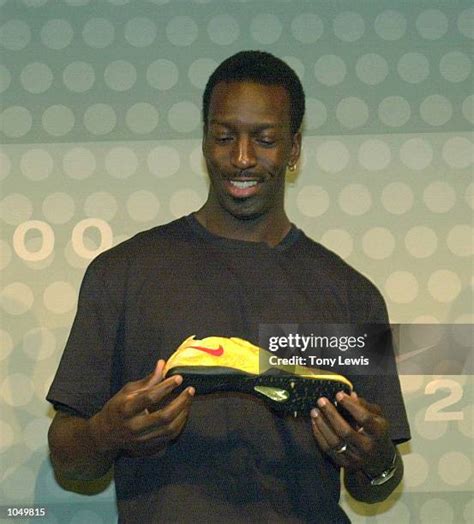 81 Michael Johnson Gold Shoes Photos & High Res Pictures - Getty Images