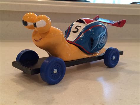 Turbo Pinewood Derby Car ~ lots of wooden balls and dowels sanded to create this car. Q was a ...