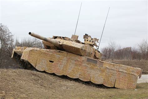 Leopard 2 A7+ with 'Barracuda' mobile multi-spectral camouflage : r/TankPorn