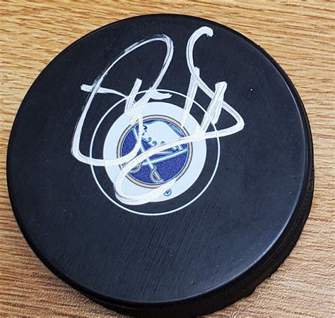 Autographed PHIL HOUSLEY Buffalo Sabres Hockey Puck - Main Line Autographs