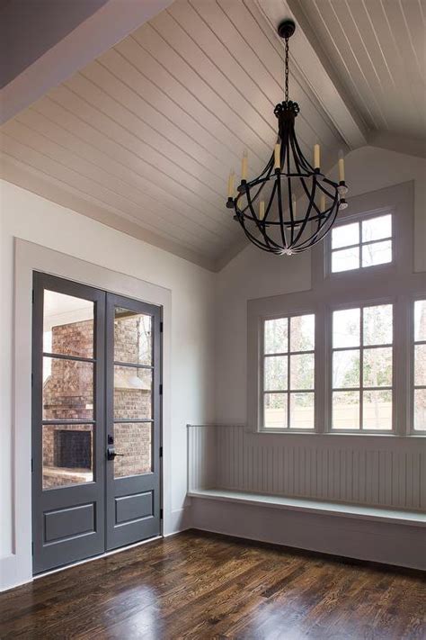 Gray Shiplap vaulted Ceiling Over Mudroom Bench - Cottage - Laundry Room