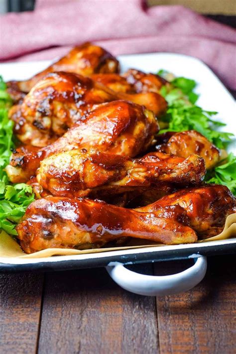 Oven Baked BBQ Chicken Drumsticks made with a sweet and tangy BBQ sauce, baked juicy and ...