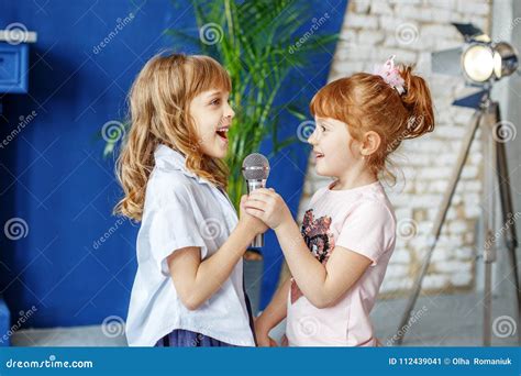 Two Funny Kids Sing a Song in Karaoke. the Concept is Childhood, Stock Image - Image of musician ...