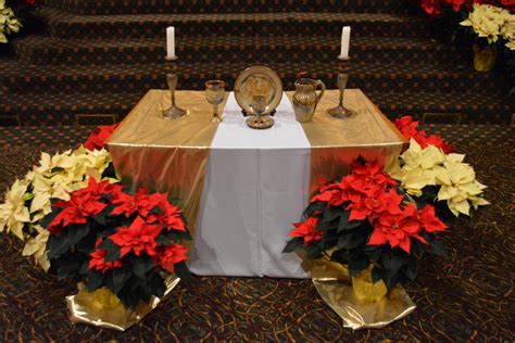 poinsettias & communion table – Pilgrim Congregational United Church of Christ