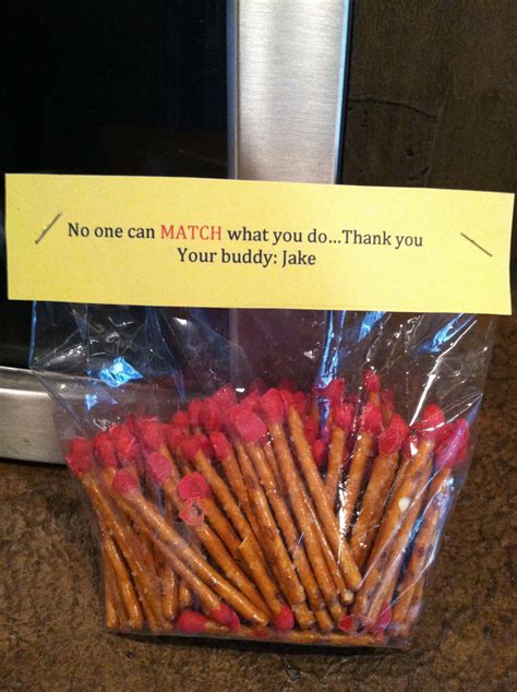 Matches for a fireman gift basket, pretzel rods dipped in red chocolate ...