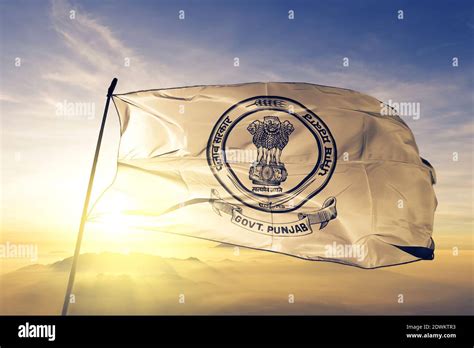 Punjab state of India flag waving on the top sunrise mist fog Stock Photo - Alamy