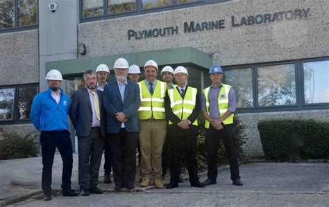 Construction team hand-over newly refurbished scientific research ...