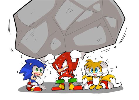 two sonic and tails are under a large rock