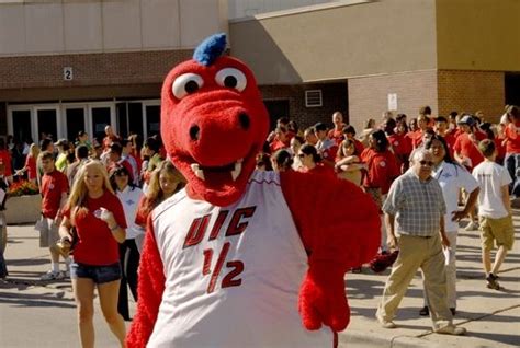 UIC Flames mascot, Sparky D. Dragon. | Blue dragon, Red and blue, Mascot