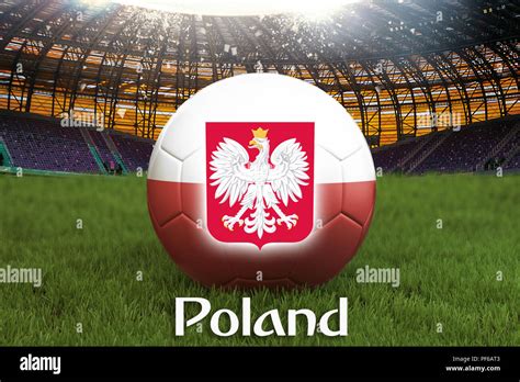 Poland football team ball on big stadium background with Poland Team logo competition concept ...