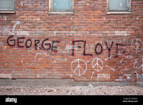 George Floyd graffiti on brick wall in Munkkisaari district of Helsinki ...