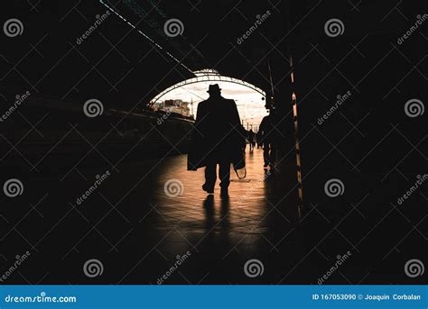 Silhouette of Passengers in a Train Station Stock Photo - Image of ...