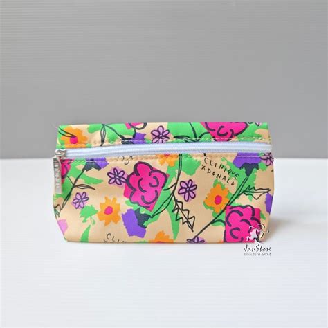 Clinique 2023 XDonald Print Makeup Pouch, Women's Fashion, Bags & Wallets, Purses & Pouches on ...