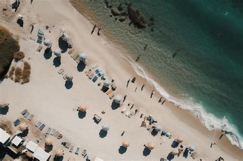 Premium AI Image | Aerial view of a beach with umbrellas and umbrellas