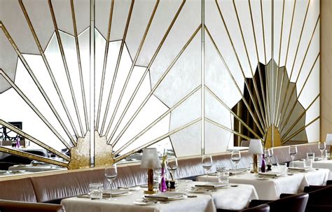 Sunburst Art Deco Mirrors behind a banquette - Celebrate & Decorate