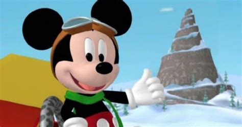 a mickey mouse is giving the thumbs up