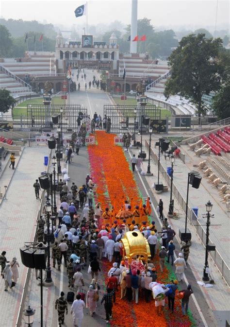 Attari (Punjab): Sikh devotees cross Attari-Wagah border to reach ...