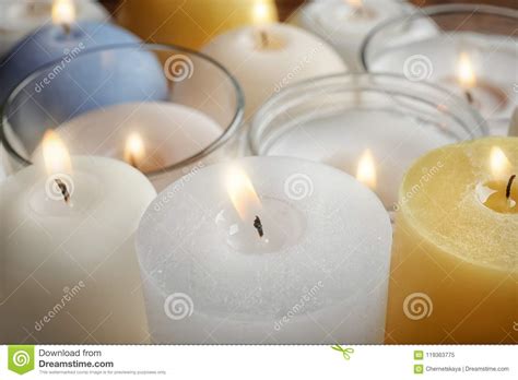 Burning Wax Candles of Different Shapes and Colors Stock Image - Image ...