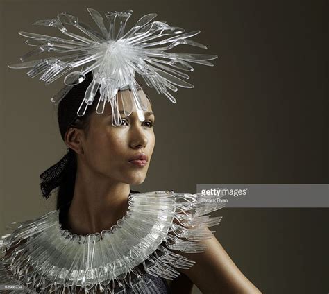 Woman in Cutlery Headgear and Necklace | Recycled costumes, Headgear ...