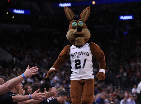 The Spurs Mascot Catches a Live Bat, While Wearing a Batman Costume