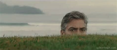 George Clooney GIF - Cliffs Spy Peeping - Discover & Share GIFs