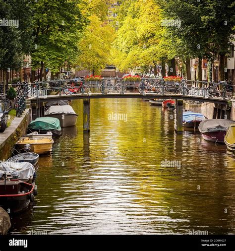 Bridge over canal in Amsterdam Stock Photo - Alamy