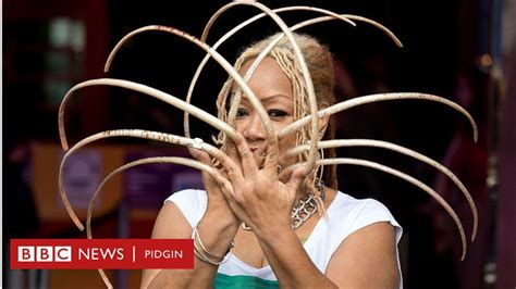 Woman with world longest fingernails Ayanna Williams cut dem afta almost 30 years - See why she ...