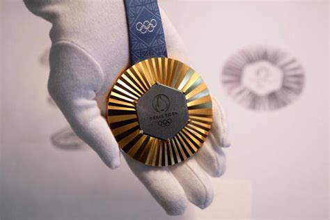 The Paris Olympics medals are embedded with pieces of the Eiffel Tower