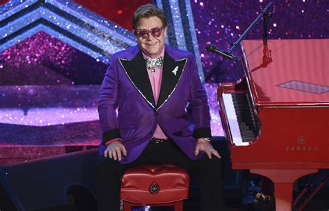 Elton John opens his Oscar night party to all this year | AP News