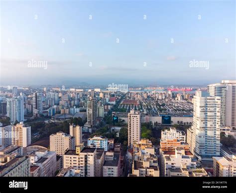 Aerial view of the waterfront to the ocean with its high buildings in ...