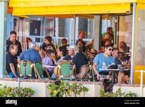 Fort Lauderdale, FL, USA - March 30, 2024: Tourists dining on Fort Lauderdale Beach restaurants ...