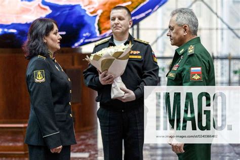 MARCH 24, 2023: Russia s Defence Minister Sergei Shoigu (R) awards the Order of Courage to Black