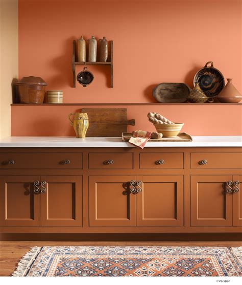 An orange wall can bring extra rustic warmth to any kitchen. Color Name: Valspar Toasted Ap ...