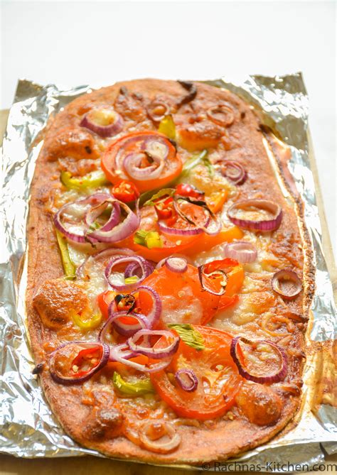 Crispy Thin Crust Pizza Recipe | Healthy whole wheat pizza - Rachna's ...