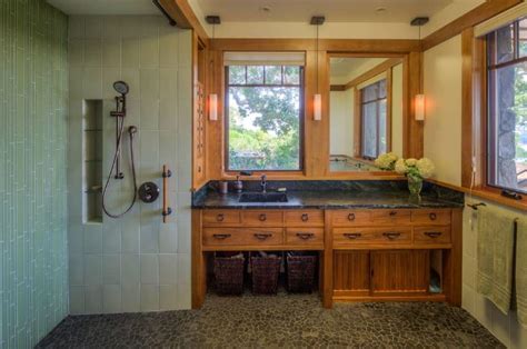 This craftsman-style bathroom has two sections. On the left side is the ...