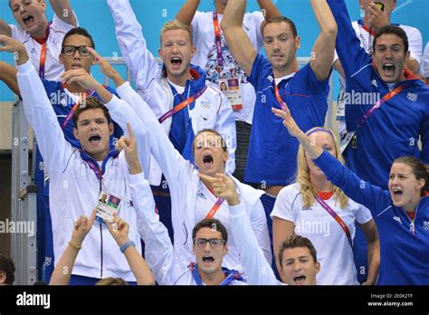 France's Florent Manaudou (L) and his sister Laure Manaudou celebrate ...