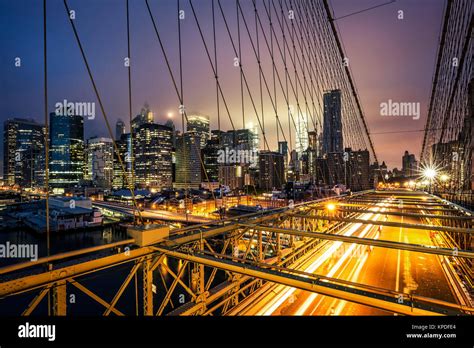 View of Brooklyn Bridge at sunset, NYC Stock Photo - Alamy