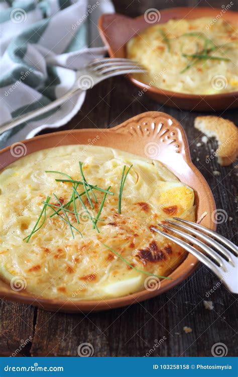 French Cuisine. Eggs and Onions with Bechamel Sauce and Cheese Stock Photo - Image of food ...